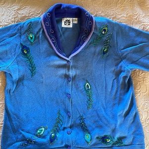 3x Storybook Knits peacock sweater in blue and purple